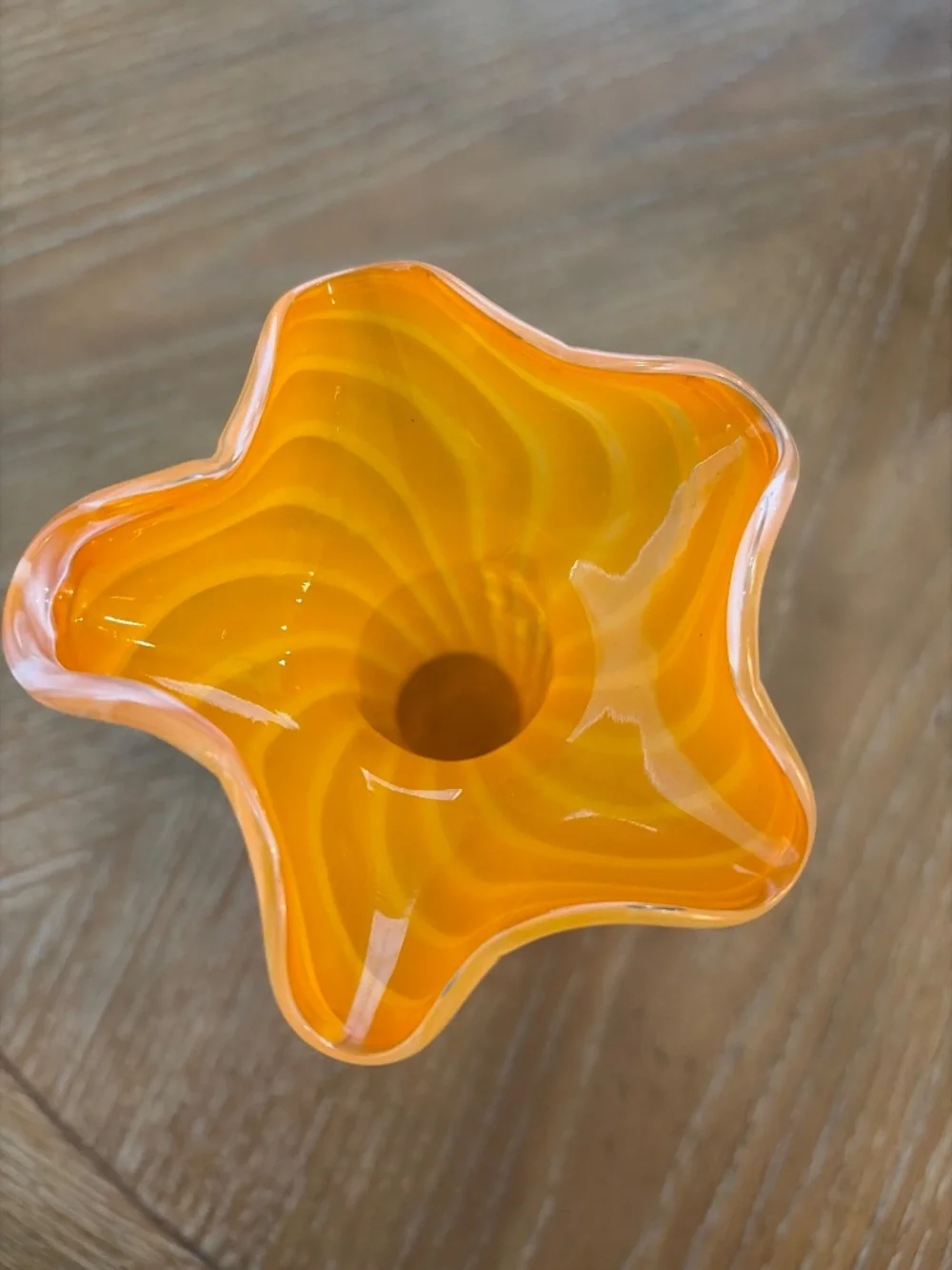 Marano hand blown orange and white vase.